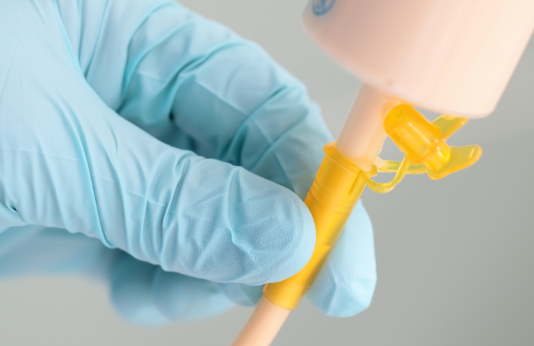 Blood Glucose Monitoring and Insulin Administration Medical instruments including a stethoscope and pen-like devices on a light background.